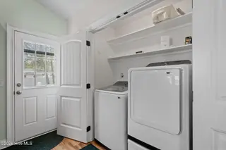 208 NE 52nd Street, Oak Island, NC 28465 – photo 10: 22-web-or-mls-DSC04362