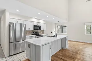 212 Kings Trail # A, Sunset Beach, NC 28468 – photo 5: Upstairs kitchen