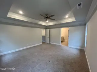 1221 Mandevilla Drive SE, Bolivia, NC 28422 – photo 23: Primary Suite