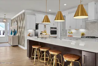 1313 Pandion Drive, Wilmington, NC 28411 — 5-bedroom home in Scotts Hill Village, Wilmington, NC, photo 9 of 21: Kitchen - NOT SUBJECT HOME SIMILAR PHOTO