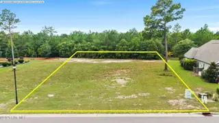 9500 195 Fallen Pear Lane NE, Leland, NC 28451 — lot in The Bluffs on the Cape Fear, Leland, NC, photo 2 of 41: 10_DJI_20260923162111_0849_D copy