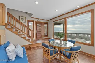 111 Dogwood Circle, Pine Knoll Shores, NC 28512 – photo 22: Sitting area with patio access