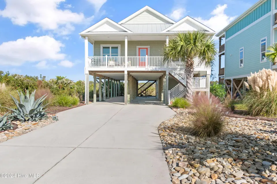 1020 W Pelican Drive, Oak Island, NC 28465 – photo 1 of 47: 1020 W Pelican