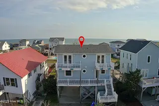 2519 W Dolphin Drive, Oak Island, NC 28465 – photo 4: Dolphin Front (1)