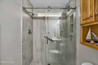 732 Ocracoke Drive, Wilmington, NC 28412 – photo 17: Beautiful custom tile/glass shower