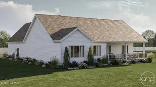 305 Planters Ridge Drive SW, Sunset Beach, NC 28468 — 3-bedroom home in Sea Trail Plantation, Sunset Beach, NC, photo 5 of 17: Rear of house