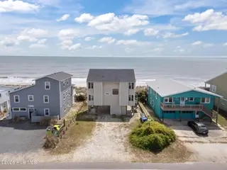3909 W Beach Drive, Oak Island, NC 28465 – photo 6: 4-web-or-mls-DJI_20260408135851_0407_D