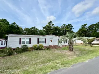 616 7th Street SE, Bolivia, NC 28422 — 3-bedroom manufactured home in Sunset Harbor, Bolivia, NC, photo 1 of 24