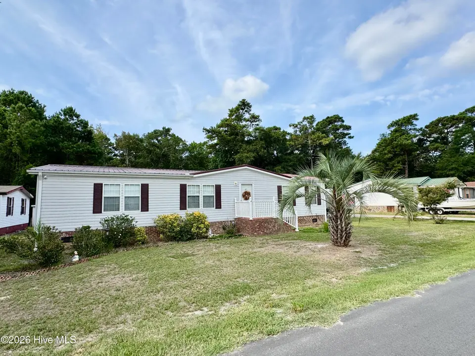 616 7th Street SE, Bolivia, NC 28422 — 3-bedroom manufactured home in Sunset Harbor, Bolivia, NC, photo 1 of 24