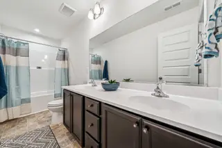 299 Enfield Drive, Carthage, NC 28327 – photo 24: 23- Maxwell HHHunt Homes Hall Bathroom