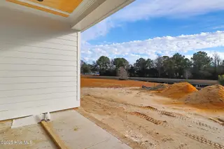 205 Cumberland Street, Newport, NC 28570 – photo 21: Back porch overlooking pond