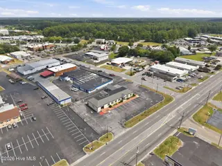 3111 S Memorial Drive, Greenville, NC 27834 – photo 8: 10-web-or-mls-DJI_20260622151641_0077_D