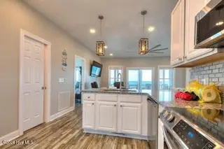 5103 W Beach Drive, Oak Island, NC 28465 – photo 17: 5103 W Beach Drive 16