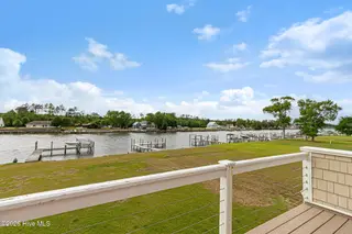 255 Gatsey Lane, Beaufort, NC 28516 — 3-bedroom home in Stanton Landing, Beaufort, NC, photo 16 of 53: Private balcony off of primary suite