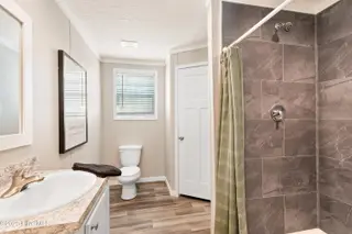 6745 Lewis Drive SE, Winnabow, NC 28479 – photo 19: Master bathroom