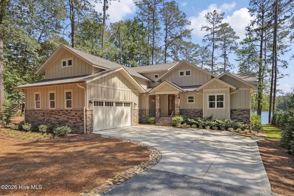 65 Lakeview Drive, Whispering Pines, NC 28327 – photo 1 of 75: Beautiful Waterfront Home
