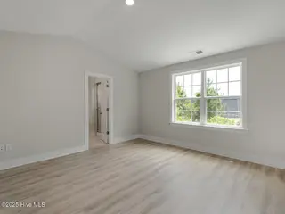210 Triton Lane, Surf City, NC 28445 – photo 21: Primary Bedroom EXAMPLE