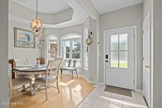 413 Pelican Harbor Road, Beaufort, NC 28516 — 3-bedroom home in Wards Creek Plantation, Beaufort, NC, photo 12 of 30: Entry and dining