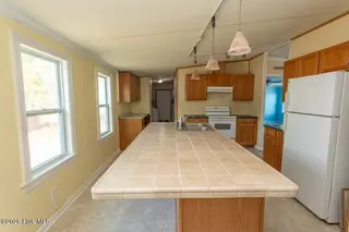 423 Gray Drive SW, Shallotte, NC 28470 — 3-bedroom manufactured home in Sherrow Estates, Shallotte, NC, photo 11 of 38