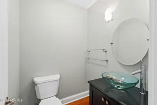 1714 Oakbrook Drive SW, Ocean Isle Beach, NC 28469 – photo 11: powder room