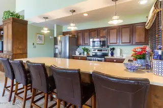 712 Canal Cove Road, Lake Waccamaw, NC 28450 – photo 16: Kitchen With Bar Seating