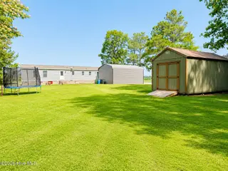 2084 Spring Garden Road, New Bern, NC 28562 — 5-bedroom manufactured home in Spring Garden, New Bern, NC, photo 18 of 19: Backyard
