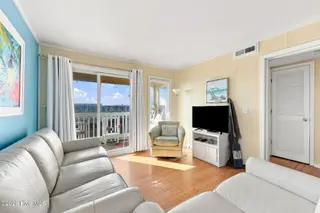 1904 E Fort Macon Road 301, Atlantic Beach, NC 28512 – photo 23: 36-web-or-mls-APATB-#301---058_with_tv_e