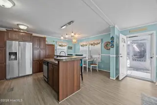 217 NE 75th Street, Oak Island, NC 28465 – photo 13: 17-web-or-mls-IMG_5225