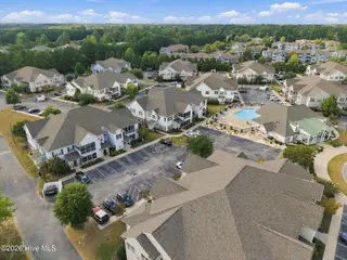 1941 Tara Court 104, Greenville, NC 27858 – photo 2: 3-web-or-mls-DJI_20260921161903_0041_D