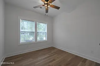 82 Northeast Drive NW, Calabash, NC 28467 – photo 19: 82NE 2nd bedroom with ceiling fan