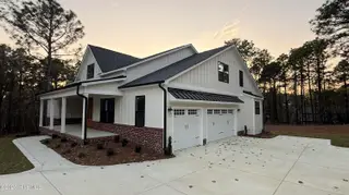 105 Myrick Court, Seven Lakes, NC 27376 – photo 2: 3 car side entry garage