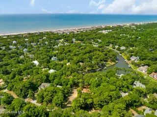 117 White Ash Drive, Pine Knoll Shores, NC 28512 – photo 23: Enjoy the privacy of the canal