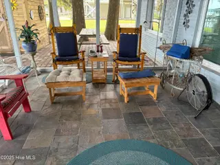 802 Canal Cove Road, Lake Waccamaw, NC 28450 – photo 21: Inside Screen Porch