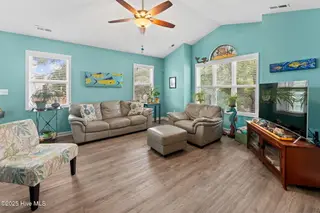 124 NW 8th Street, Oak Island, NC 28465 — 3-bedroom home in Pinners Point, Oak Island, NC, photo 4 of 47: shniderproductions.com-23