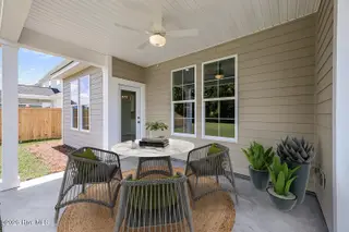 612 Dressage Way, Wilmington, NC 28411 — 4-bedroom home in Scotts Hill Village, Wilmington, NC, photo 12 of 17: Covered Porch