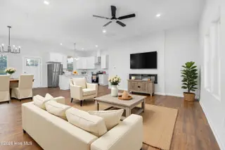 1173 Nick Coley Road, Whitakers, NC 27891 – photo 5: 1173 Nick Coley Rd Staged LR and Dining