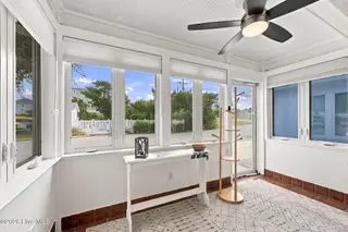 2306 Emerald Drive 1, Emerald Isle, NC 28594 — condo in Emerald Cove Condominiums, Emerald Isle, NC, photo 5 of 51: Sunroom