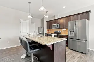 613 Knoll Circle, Greenville, NC 27858 – photo 20: Kitchen view to Garage Dr