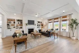 3355 Grand Park Way, Leland, NC 28451 – photo 15: Great Room - Yates II B - Foxhall Landin