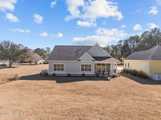 498 Genoes Point Road SW, Supply, NC 28462 – photo 3: Huge Backyard sod and irrigation