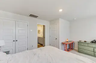 2049 Wild Indigo Circle NW, Calabash, NC 28467 – photo 20: Upper Level Bedroom