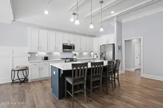 6476 Bryson Drive SW, Ocean Isle Beach, NC 28469 – photo 13: 8' island perfect for gathering