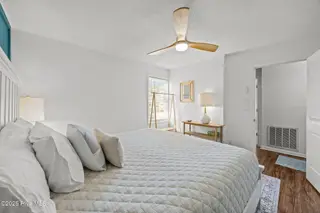 2517 Waccamaw Shores Road, Lake Waccamaw, NC 28450 – photo 20: Primary Bedroom