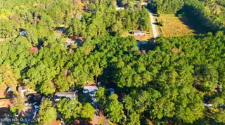 243 Ocean Forest Drive NW, Calabash, NC 28467 — 3-bedroom manufactured home in Ocean Forest, Calabash, NC, photo 19 of 61: DJI_20251101095545_0003_D