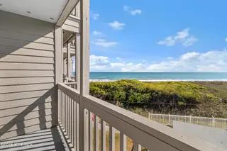 2111 W Ft Macon Road 248 Dunescape, Atlantic Beach, NC 28512 – photo 22: Covered deck off of primary suite