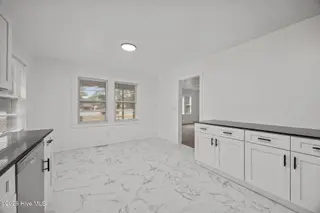 1509 SE Greenville Boulevard, Greenville, NC 27858 – photo 15: Kitchen and Dining Area