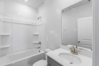 1099 Hanson Drive, Leland, NC 28451 – photo 4: Nest - Shared Full Bath