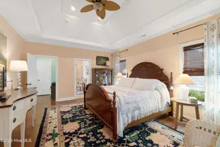 301 Hedrick Street, Beaufort, NC 28516 – photo 20: Primary suite with vaulted ceiling