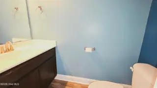 2007 Snapper Street, New Bern, NC 28562 — 4-bedroom home in Bluewater Rise, New Bern, NC, photo 13 of 31: 11b Downstairs Hall Half Bath