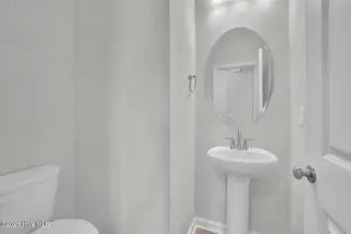 6787 Fellowship Drive, Leland, NC 28451 — 4-bedroom townhome in Grand Park, Leland, NC, photo 12 of 46: Powder room